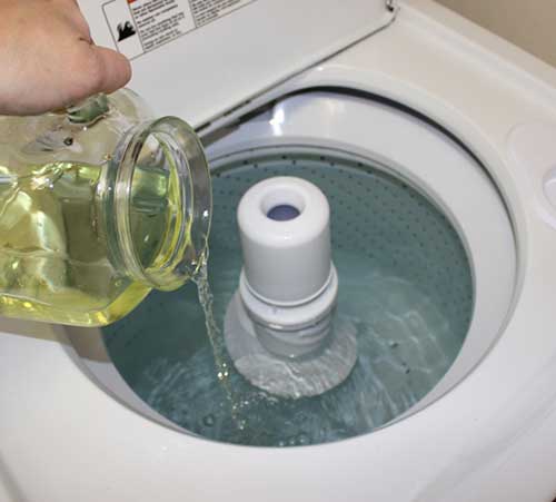 08 Clean your washing machine with vinegar & baking soda