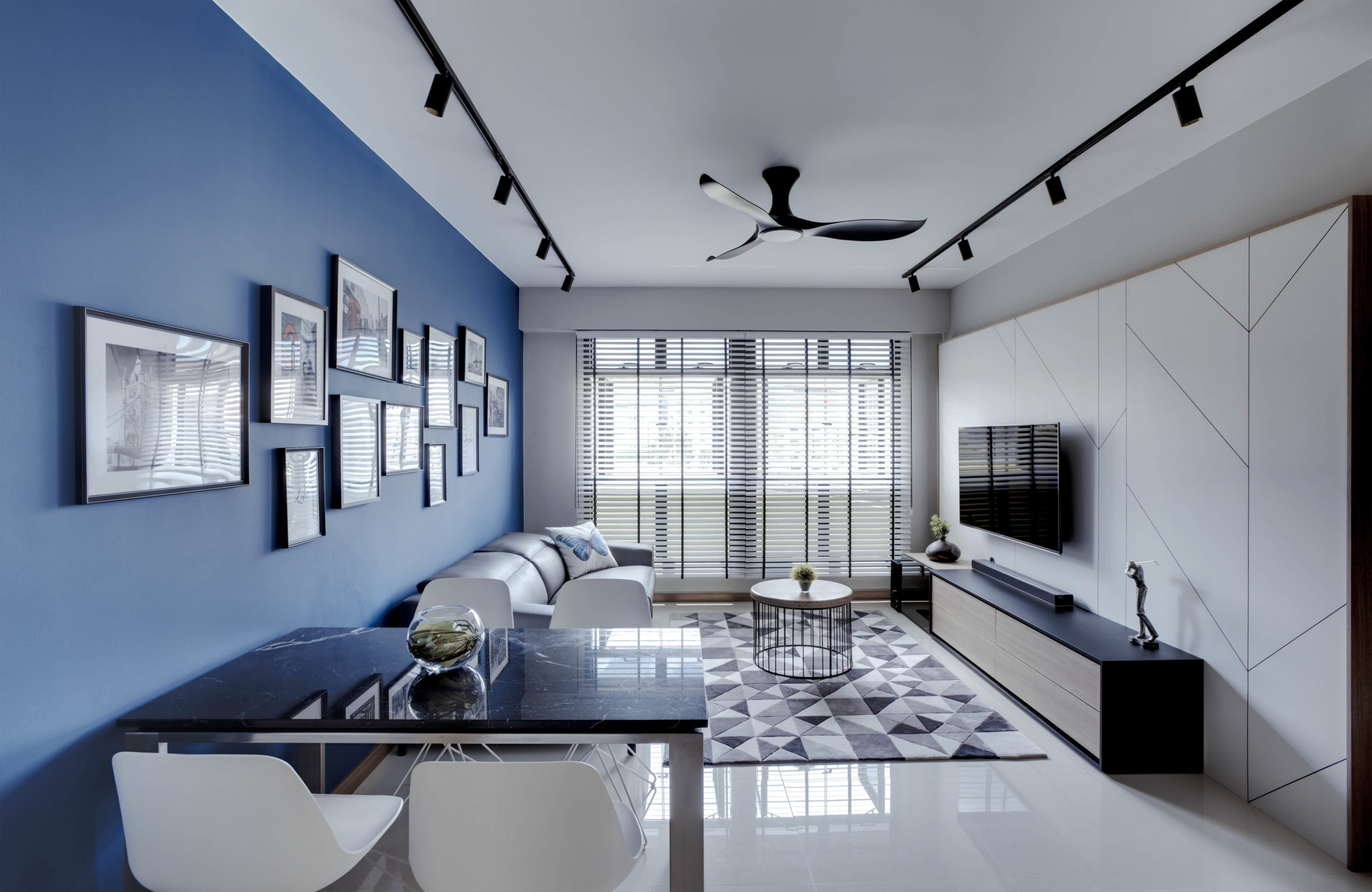 A modern contemporary HDB blue themed living room