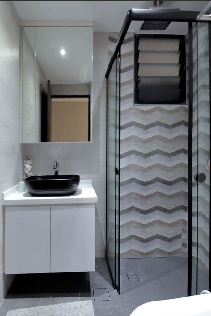 Contemporary Condo Toilet Shower Stall Design with mirror vanity and sink counter