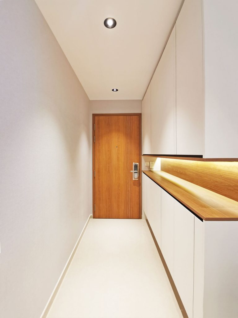 Modern Scandinavian Interior Design for Rivercove Residences EC Entryway Custom Carpentry Shoe Cabinet with Display Shelf