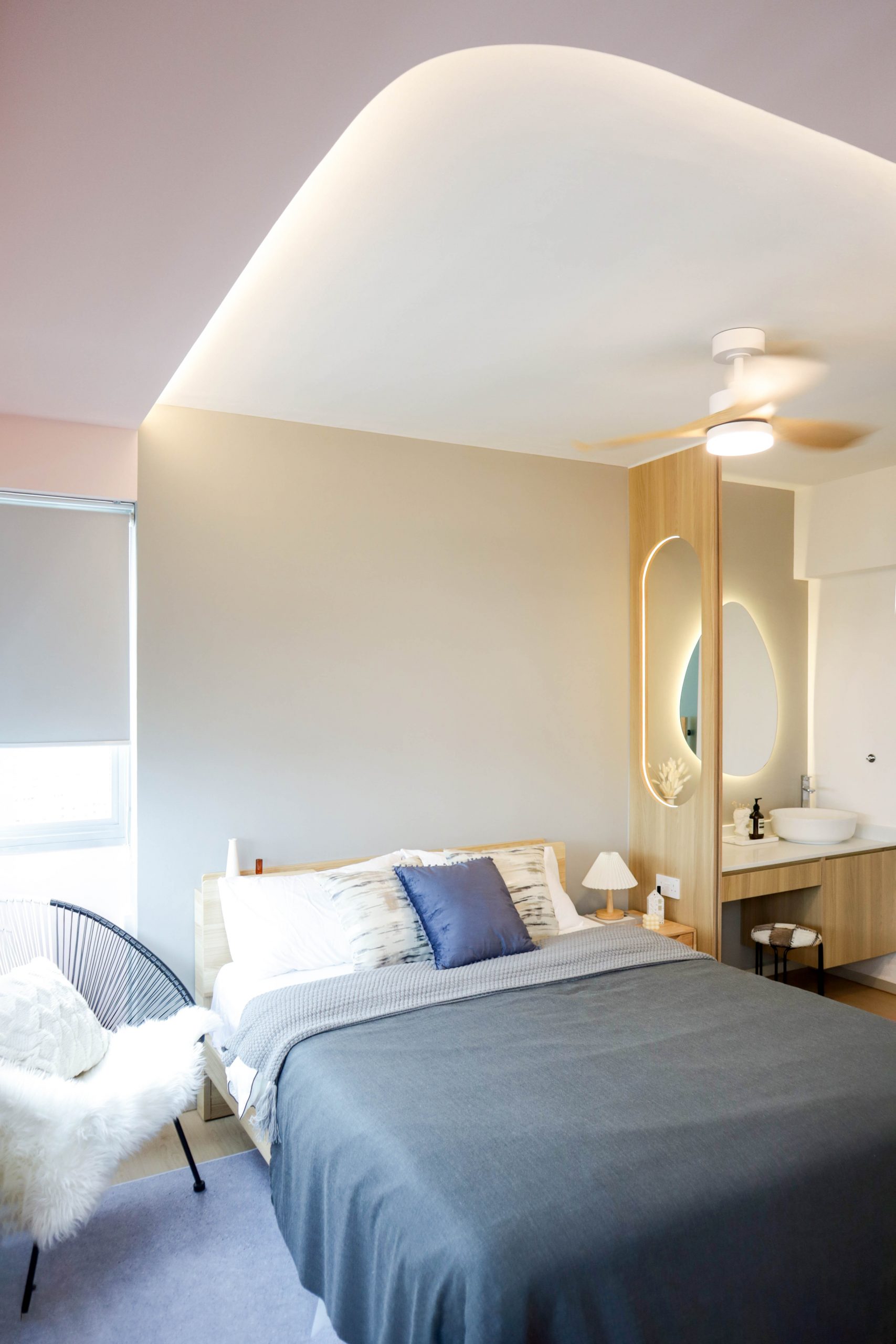 Bachelor Pad Singapore Master Bedroom with Curved Cove Lighting Design and Pink Ceiling