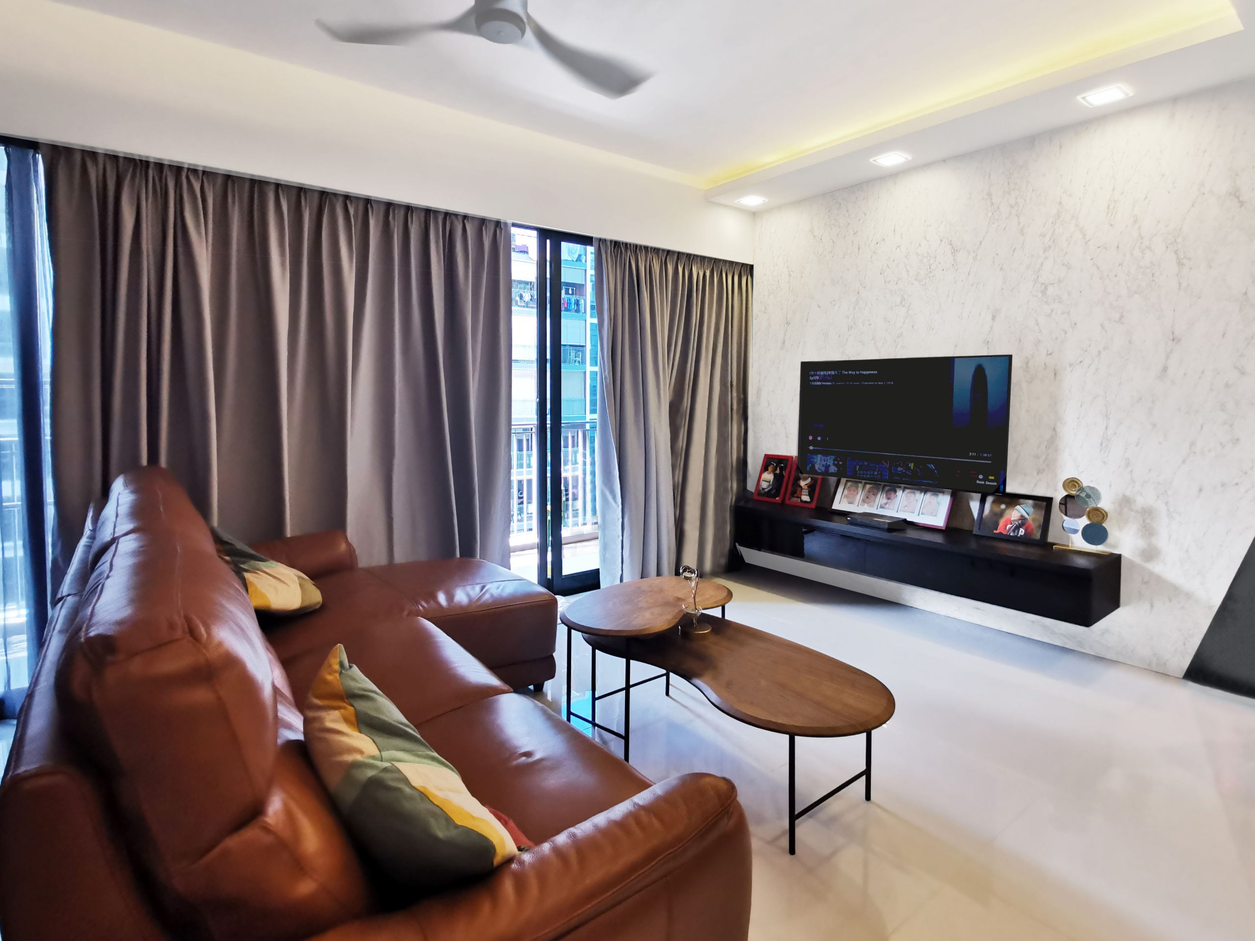 Condo living room interior design ideas marble tv feature wall