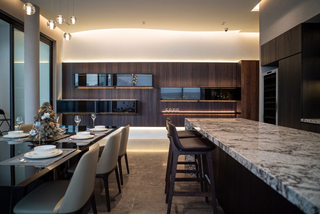 Modern Luxury interior design for dining room in marble and wood for bar counter and dining room at Dunbar walk